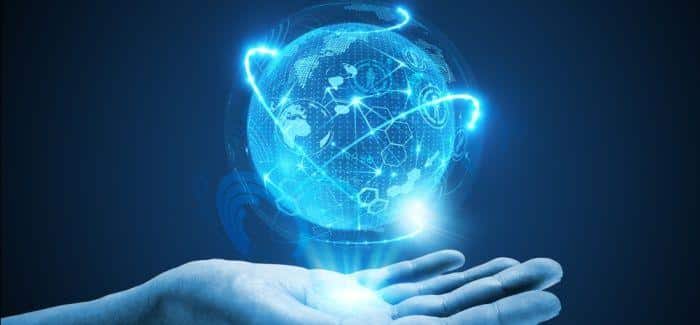 Hand holding a futuristic digital globe with technology and network graphics, representing IT education and career training at MyComputerCareer.