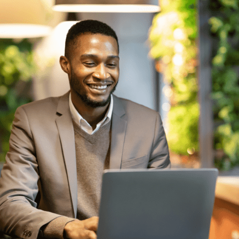 Career-focused young professional using a laptop for tech training and career development at MyComputerCareer.