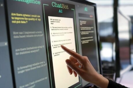 A person interacting with an AI-powered chatbot on a digital screen, emphasizing advanced technology and AI integration at MyComputerCareer.