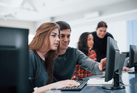 Students learning computer skills at a classroom computer lab for IT training at MyComputerCareer.